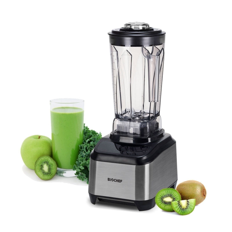 A black BioChef Atlas Power Blender with fruits and vegetables, and a smoothie surrounding it.