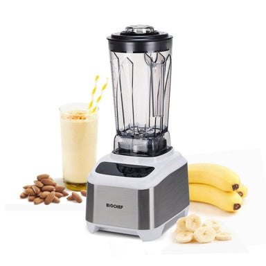 A white BioChef Atlas Power Blender with almond nuts, bananas, and  banana smoothie surrounding it.