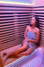 lady enjoying using the Innerlight 2 person full spectrum infrared sauna 