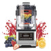 Fruits inside and on the side of Kuvings CB1000 Commercial Vacuum Blender