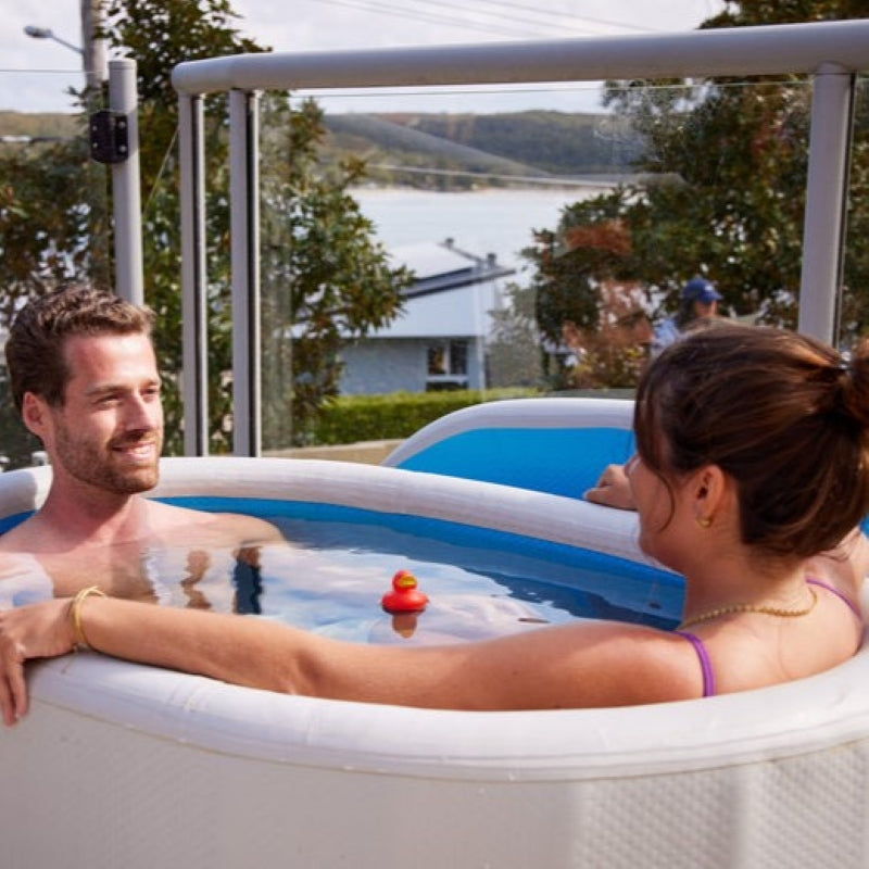 a couple bathing in the PlusLife Commercial Portable Ice Bath