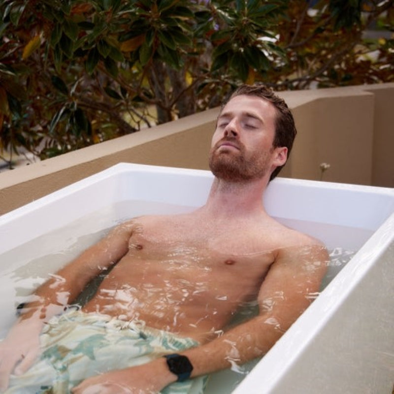 man bathing in the PlusLife Commercial Ice Bath