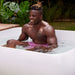 a man bathing in the PlusLife Commercial XL Ice Bath