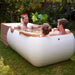 three people bathing in the PlusLife Commercial XL Ice Bath