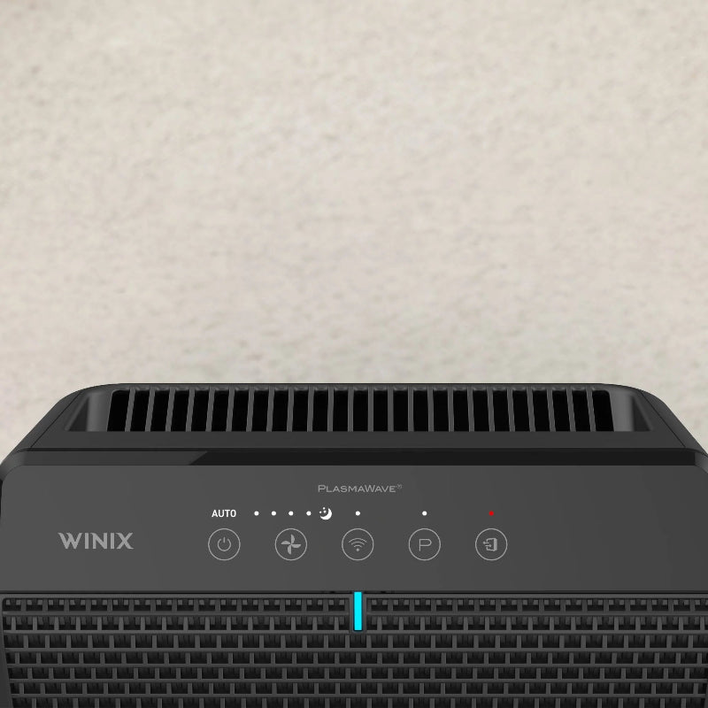 Winix air purifier on a light beige textured background
