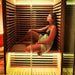 Innerlight 2 person full spectrum infrared sauna with lady inside 