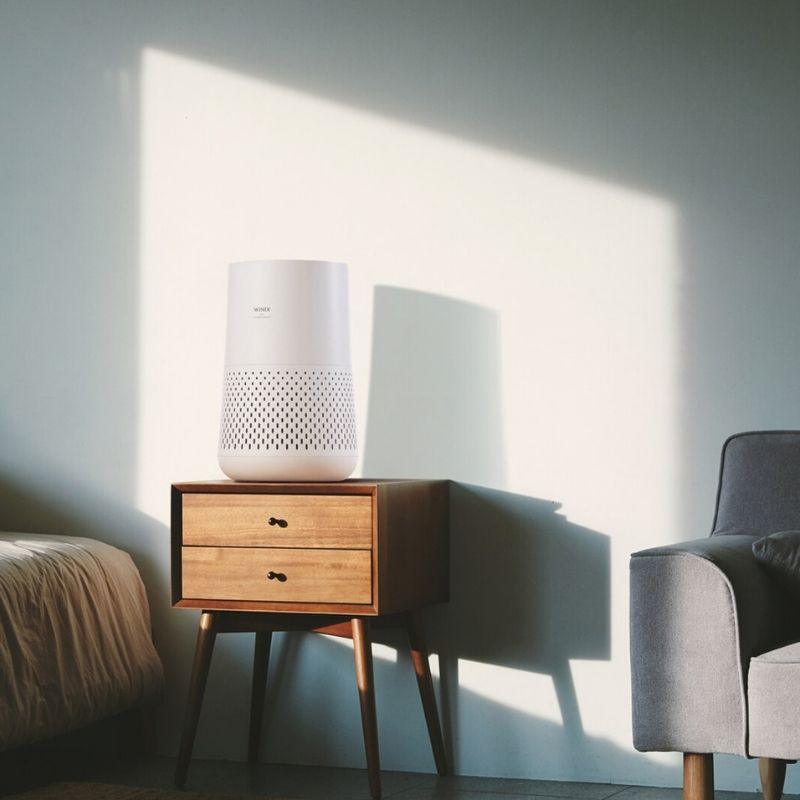 view of Winix Compact 4 Stage Air Purifier in a spare room