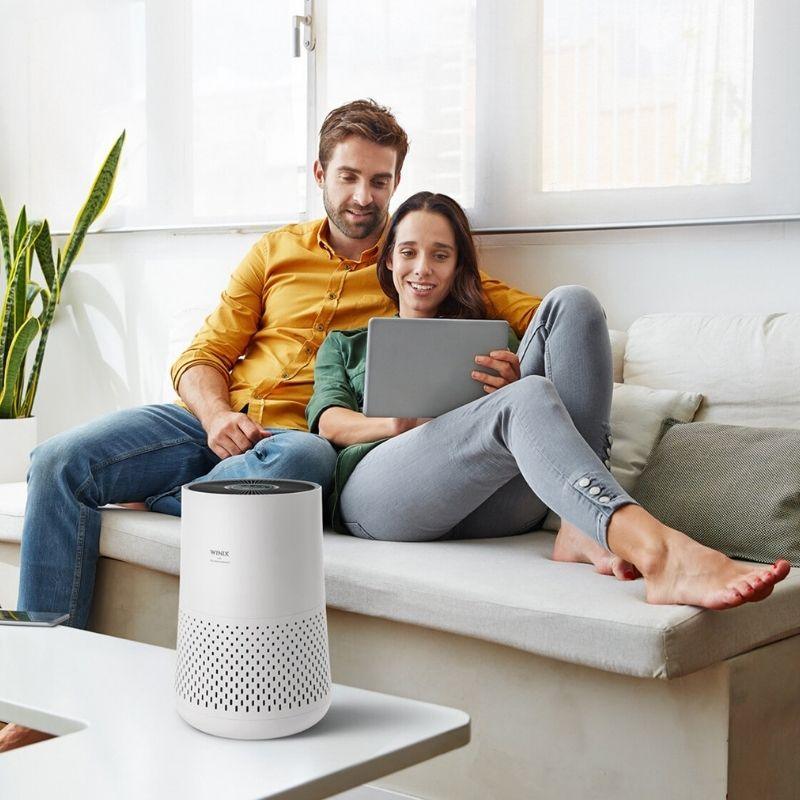 view of Winix Compact 4 Stage Air Purifier in lounge room