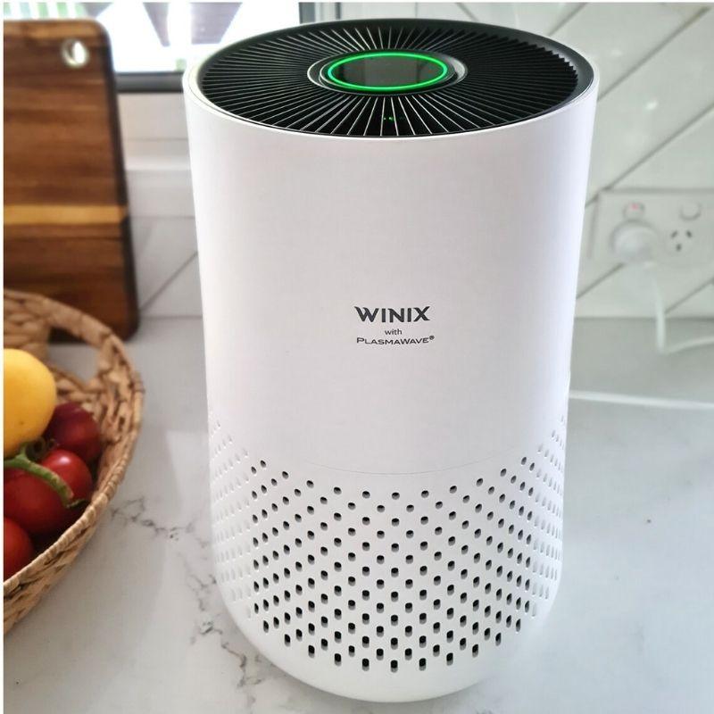 view of Winix Compact 4 Stage Air Purifier in a kitchen